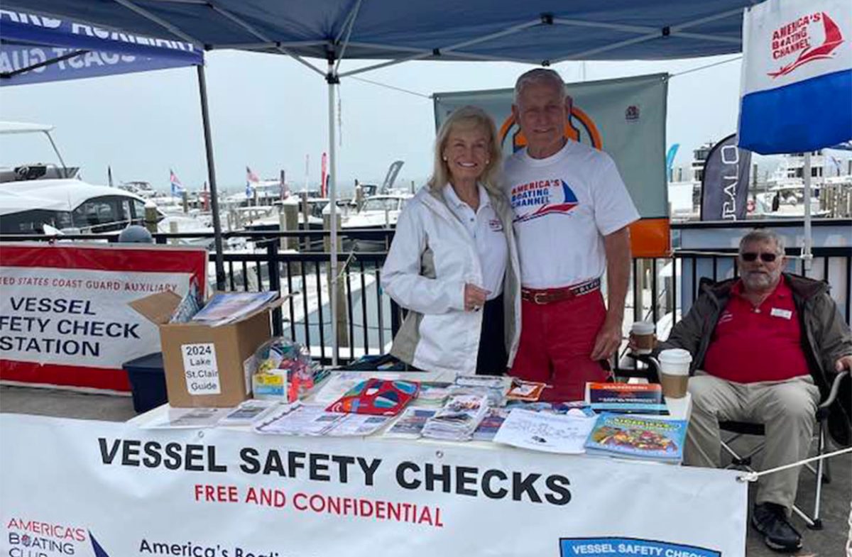 Woman and man stand together at a table for Vessel Safety Checks